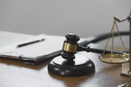 Close up Mallet of the judge at law firm of courtroom.